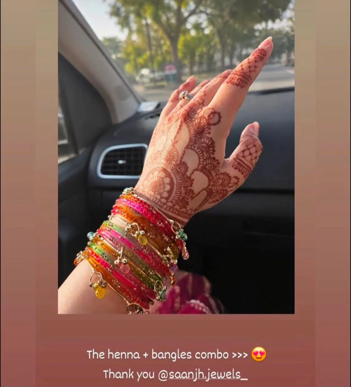 Customer wearing a colourful Saanjh Jewels bangle stack with henna