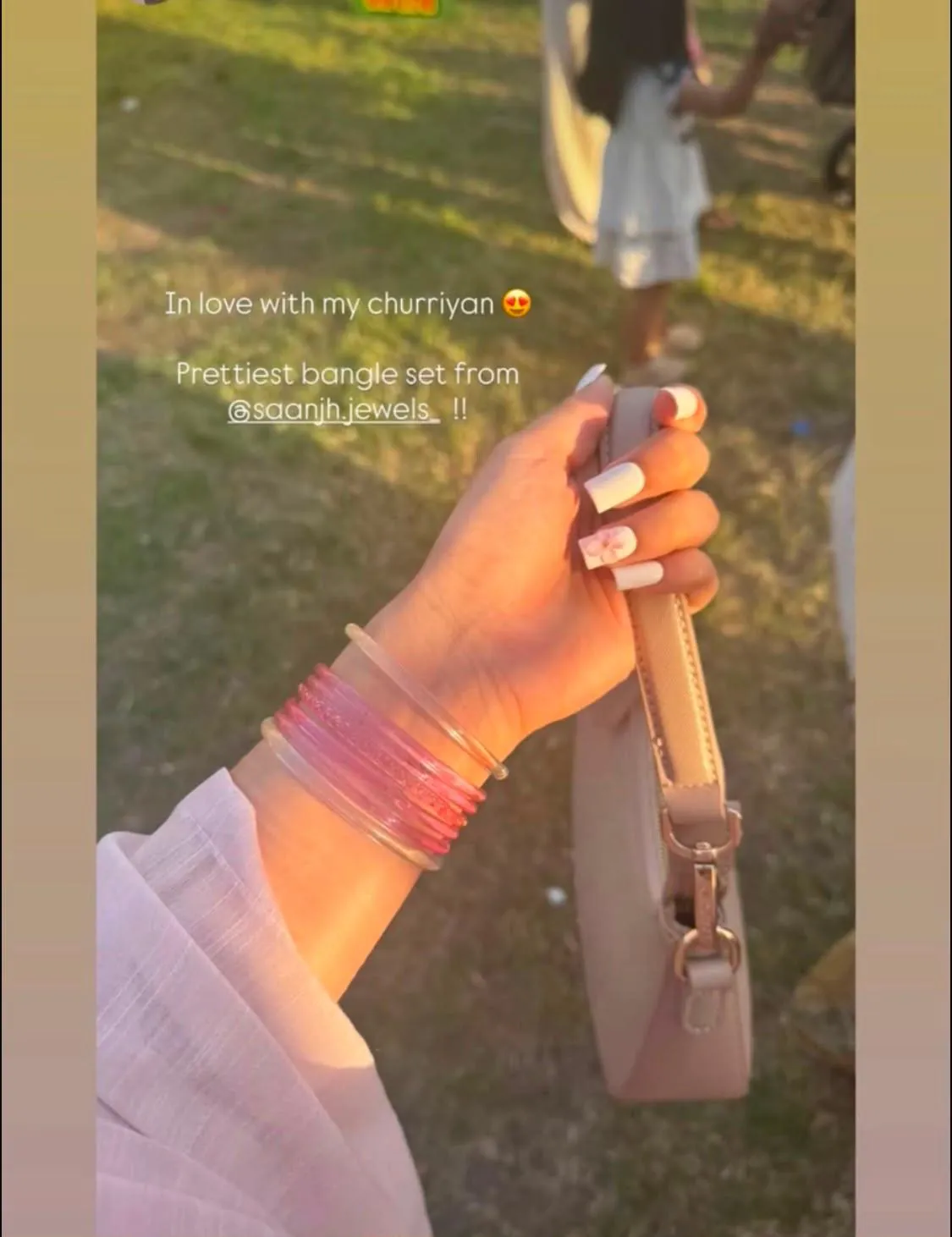 Customer wearing a pink Saanjh Jewels bangle set